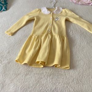 A pretty yellow dress for a 3-4 year old girl.